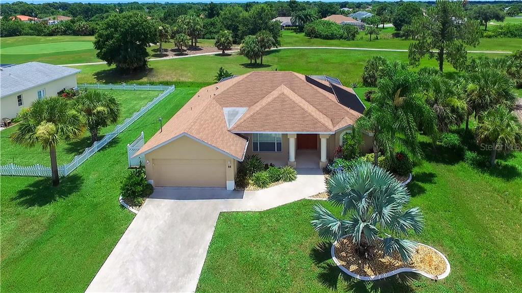 88 Marker Road Rotonda West, FL 33947 - Photo 1 of 1 a view of a house with garden