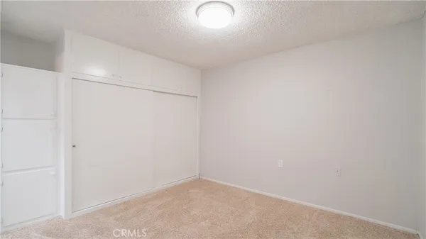 a spacious bathroom with a double vanity sink and a mirror