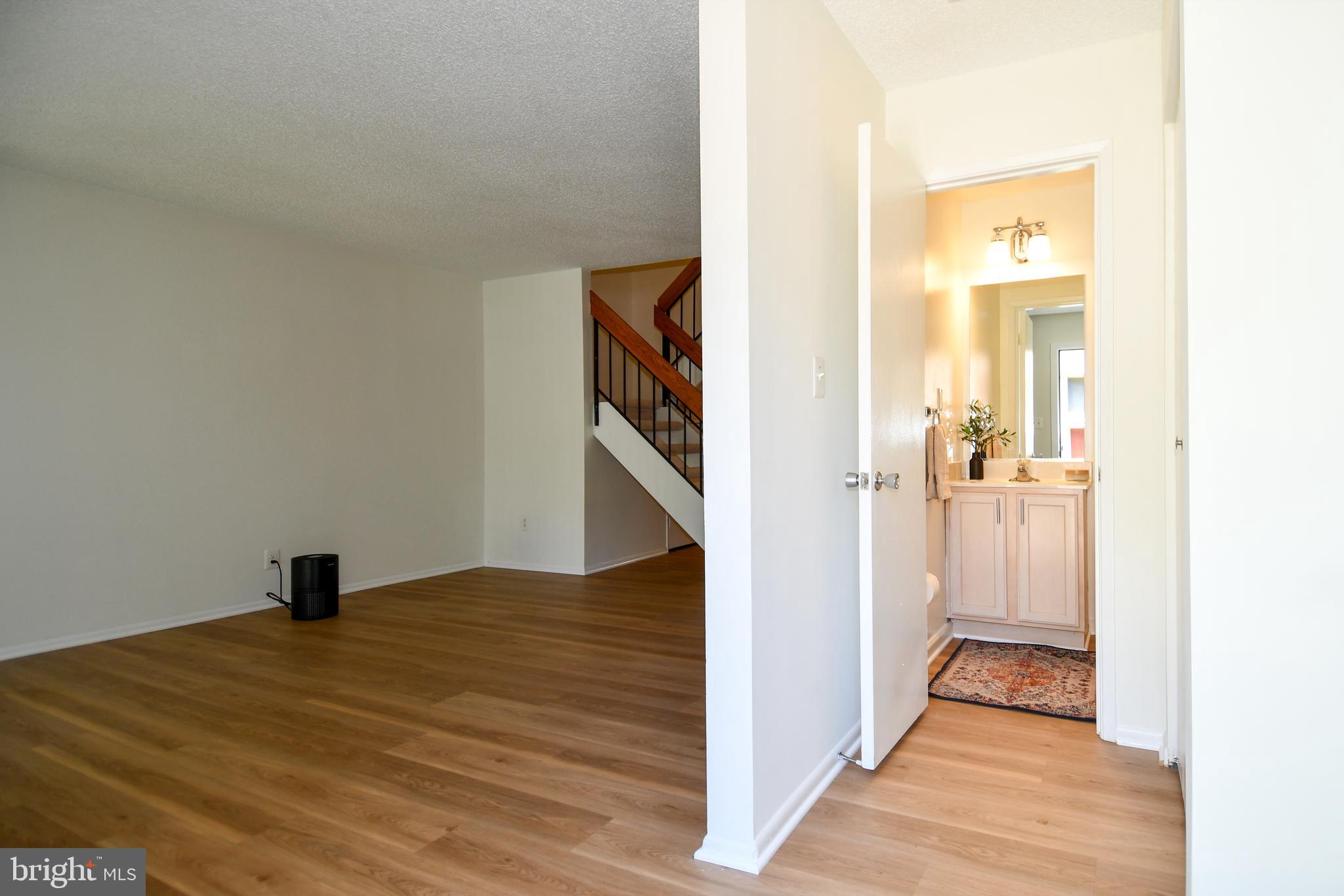 2231 Cartwright Place Reston, VA 20191 - Photo 3 of 38 Half bath and large coat closet