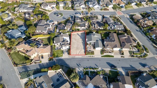 a view of a city with mountains in the background