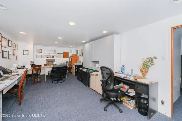 a room with furniture and a dining table