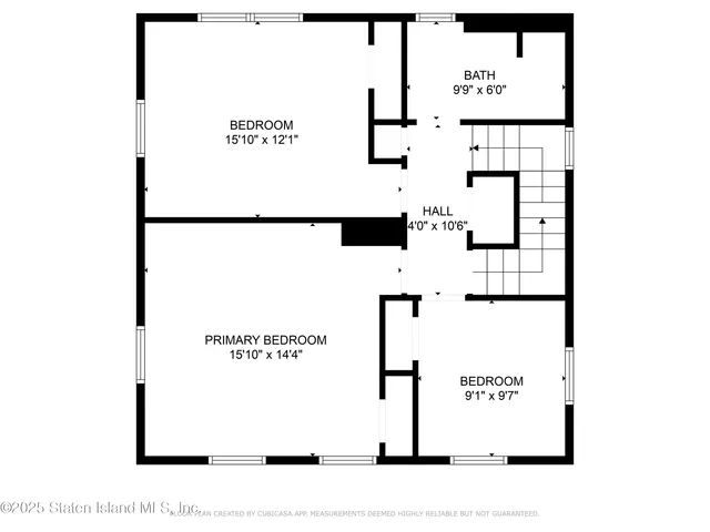 a picture of a hallway with a white wall and sign