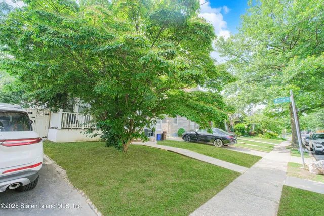 a garden view with a seating space