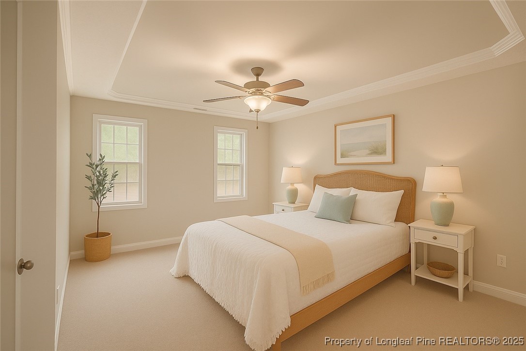203 United Road Raeford, NC 28376 - Photo 15 of 36 a bedroom with a bed and a chandelier