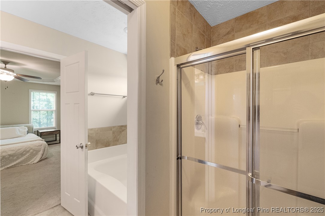 203 United Road Raeford, NC 28376 - Photo 18 of 36 a en suite bathroom with a shower