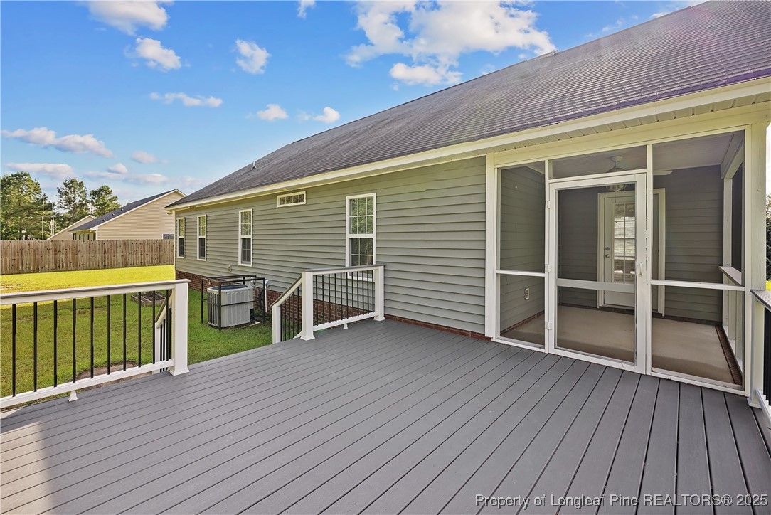 203 United Road Raeford, NC 28376 - Photo 27 of 36 a view of a house with a balcony