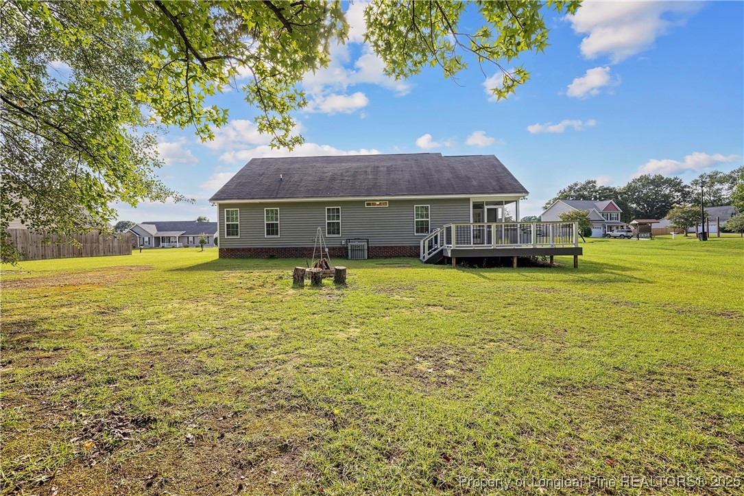 203 United Road Raeford, NC 28376 - Photo 29 of 36 a view of a house with a yard
