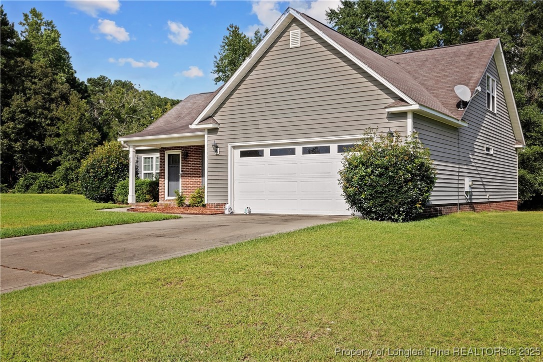 203 United Road Raeford, NC 28376 - Photo 30 of 36 a view of backyard of house with green space