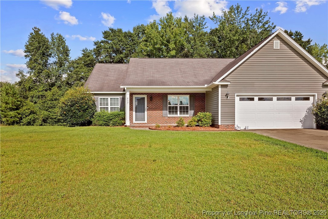 203 United Road Raeford, NC 28376 - Photo 3 of 36 a view of a house with pool and chairs