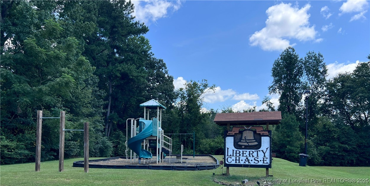 203 United Road Raeford, NC 28376 - Photo 34 of 36 a front view of a house with garden