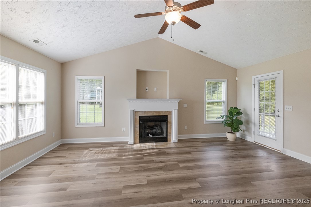 203 United Road Raeford, NC 28376 - Photo 5 of 36 a view of an empty room with window and fire place