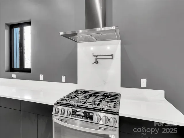 a white toilet sitting next to a window