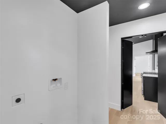 a white bath tub sitting in a bathroom