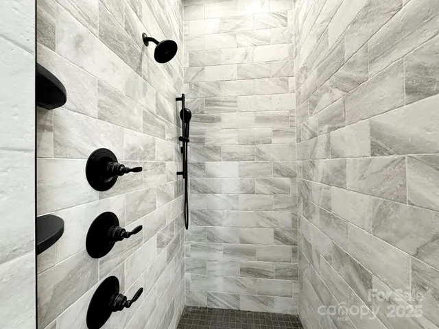 a view of a house with a snow on the road