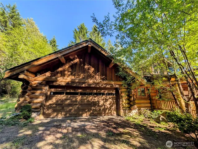 a big yard with lots of tress in it