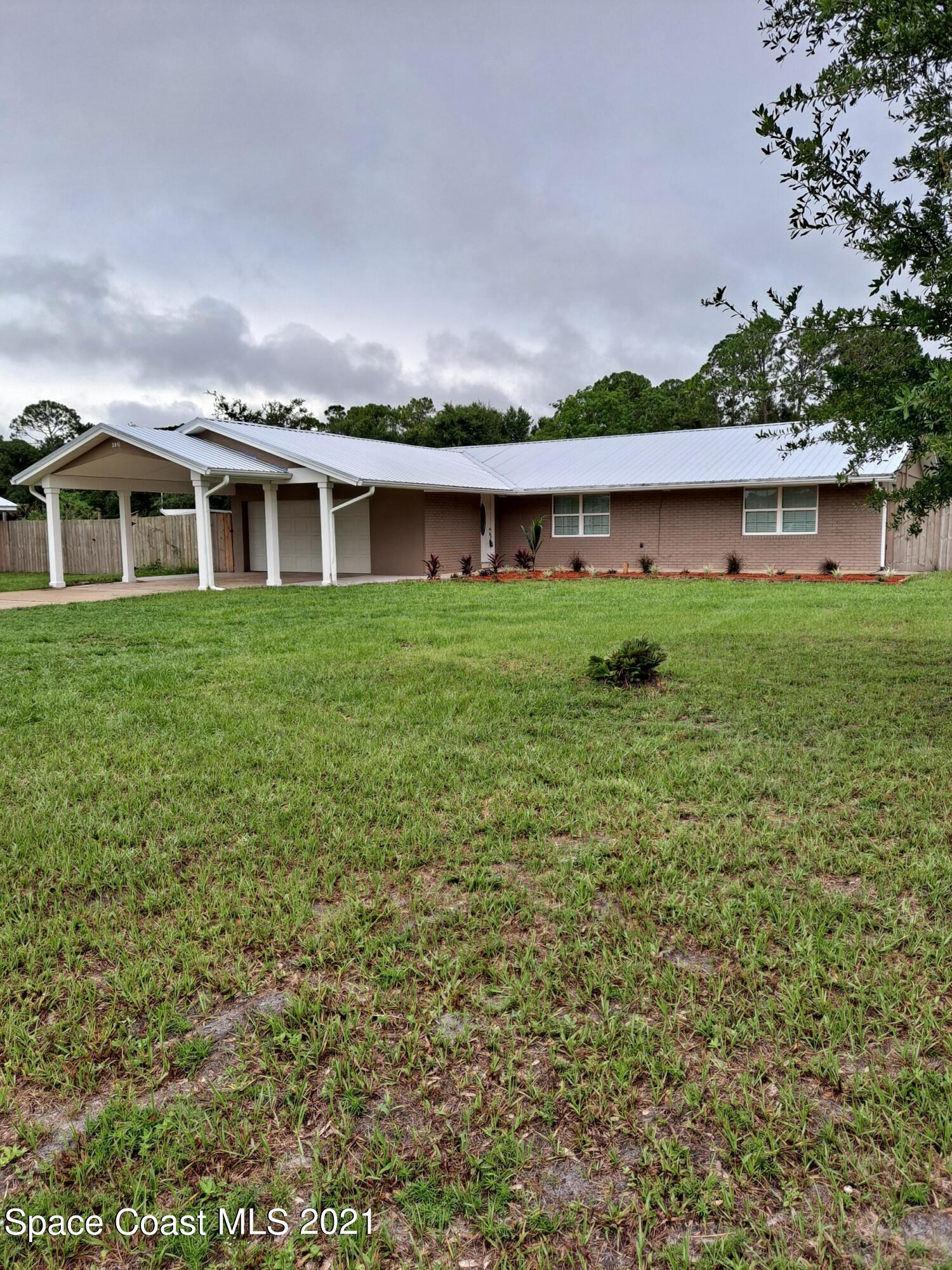 3941 Burkholm Road Mims, FL 32754 - Photo 1 of 19 3941 Burkholm Resized_20210703_103533
