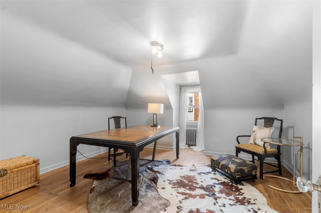 3609 Northcliffe Road University Heights, OH 44118 - Photo 21 of 26 Office space featuring lofted ceiling, wood finished floors, and radiator