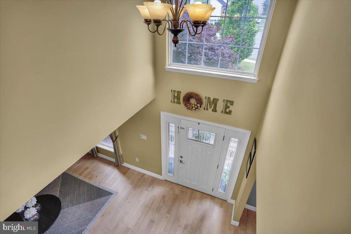 7 Kantner Lane North Reading, PA 19607 - Photo 26 of 50 a view of a hallway with wooden floor and a window