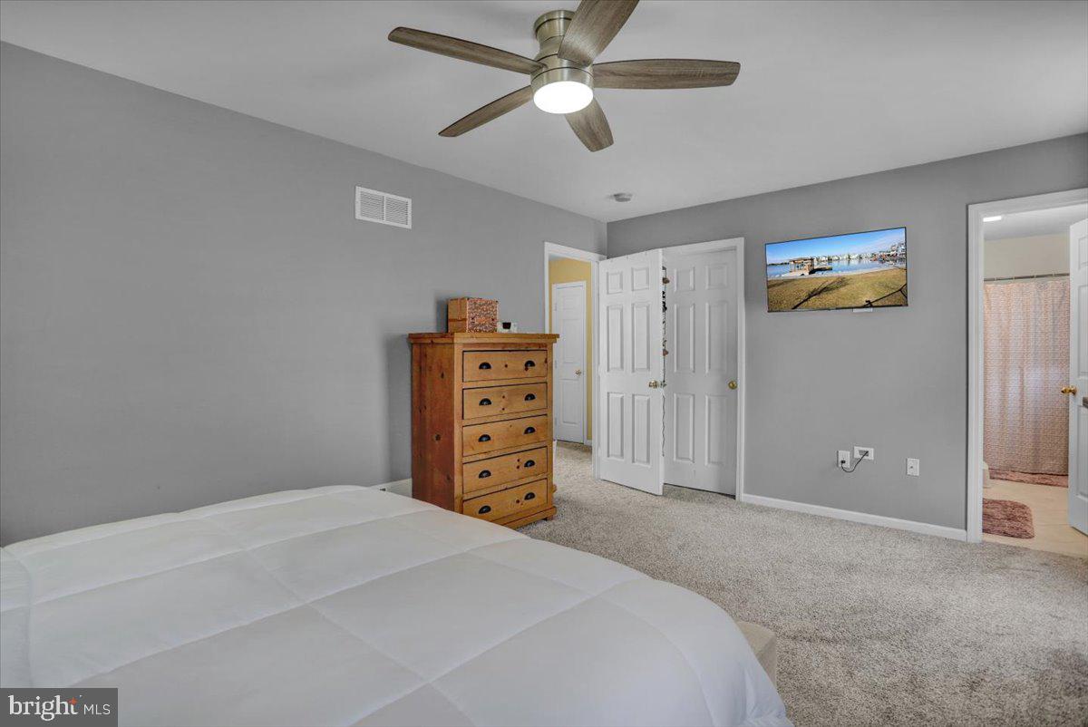 7 Kantner Lane North Reading, PA 19607 - Photo 33 of 50 a bedroom with a bed and a chandelier
