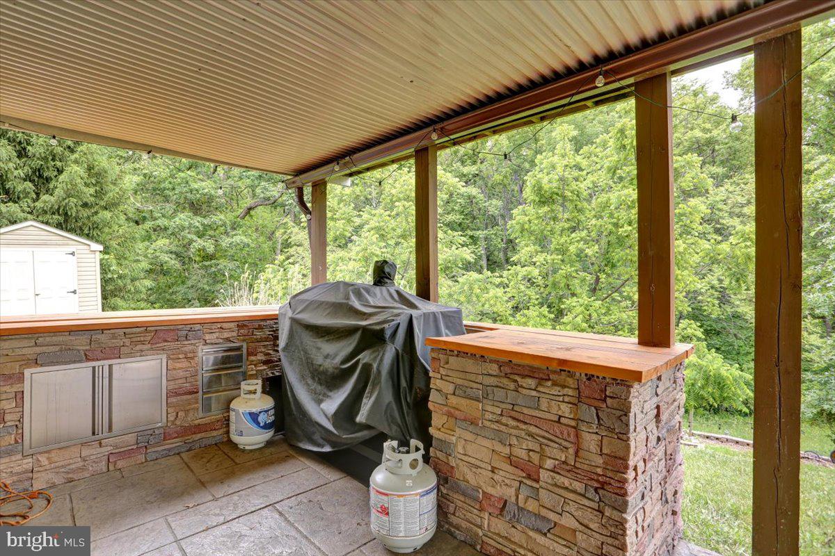 7 Kantner Lane North Reading, PA 19607 - Photo 45 of 50 a view of a porch with furniture and garden
