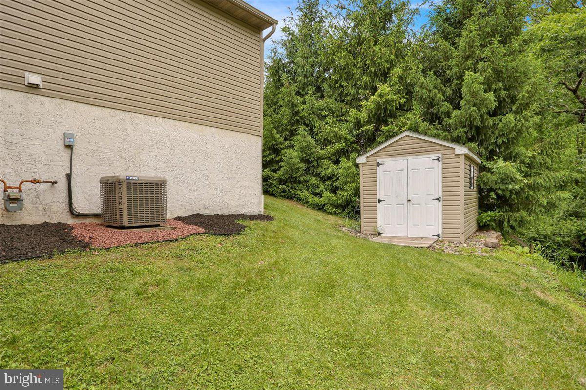 7 Kantner Lane North Reading, PA 19607 - Photo 46 of 50 a view of a house with a yard and garage