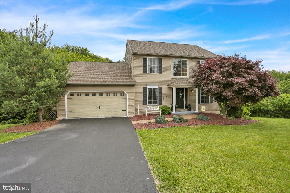 7 Kantner Lane North Reading, PA 19607 - Photo 5 of 50 a front view of a house with a yard and garage