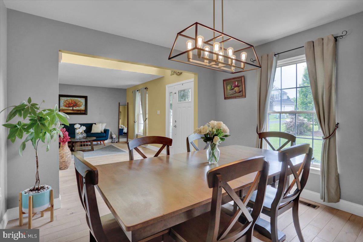 7 Kantner Lane North Reading, PA 19607 - Photo 7 of 50 a view of a dining room with furniture a chandelier and wooden floor