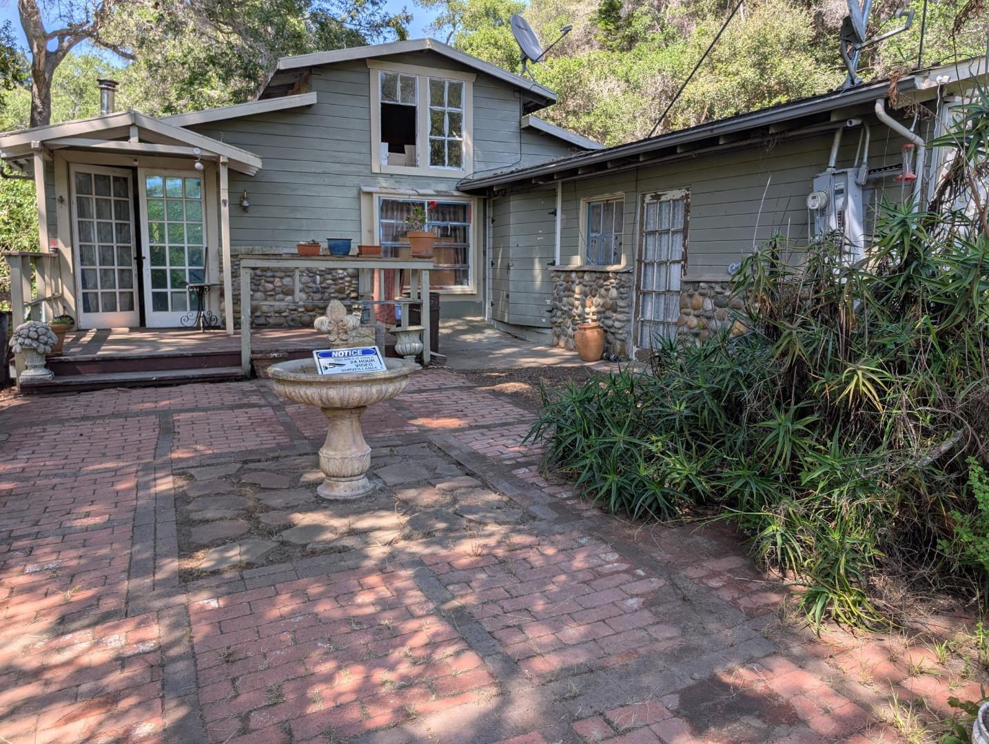 4576 Paul Sweet Road Santa Cruz, CA 95065 - Photo 23 of 29 a front view of a house with garden