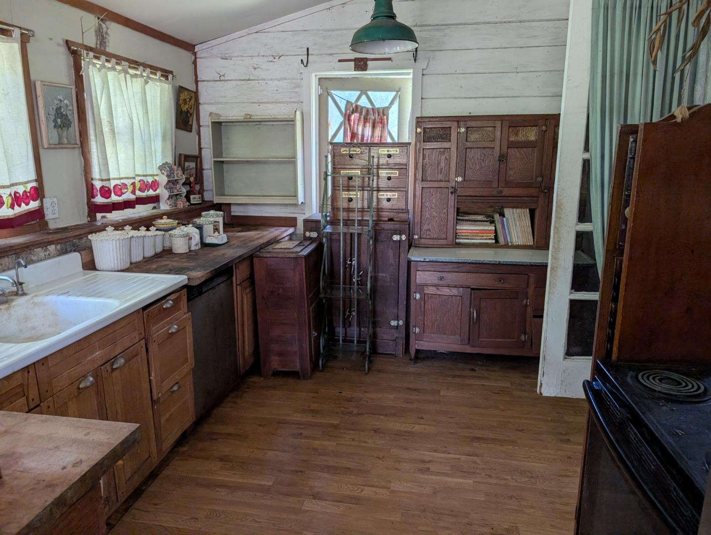 4576 Paul Sweet Road Santa Cruz, CA 95065 - Photo 27 of 29 a kitchen with stainless steel appliances a sink stove and refrigerator