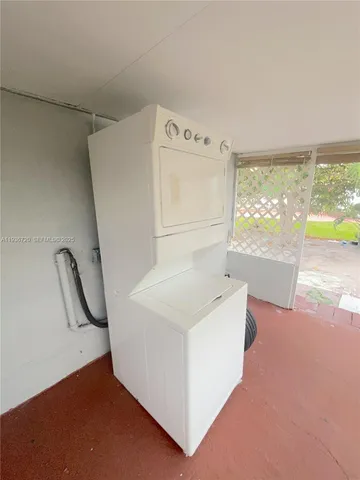 a bathroom with a sink a toilet a shower a vanity and mirror