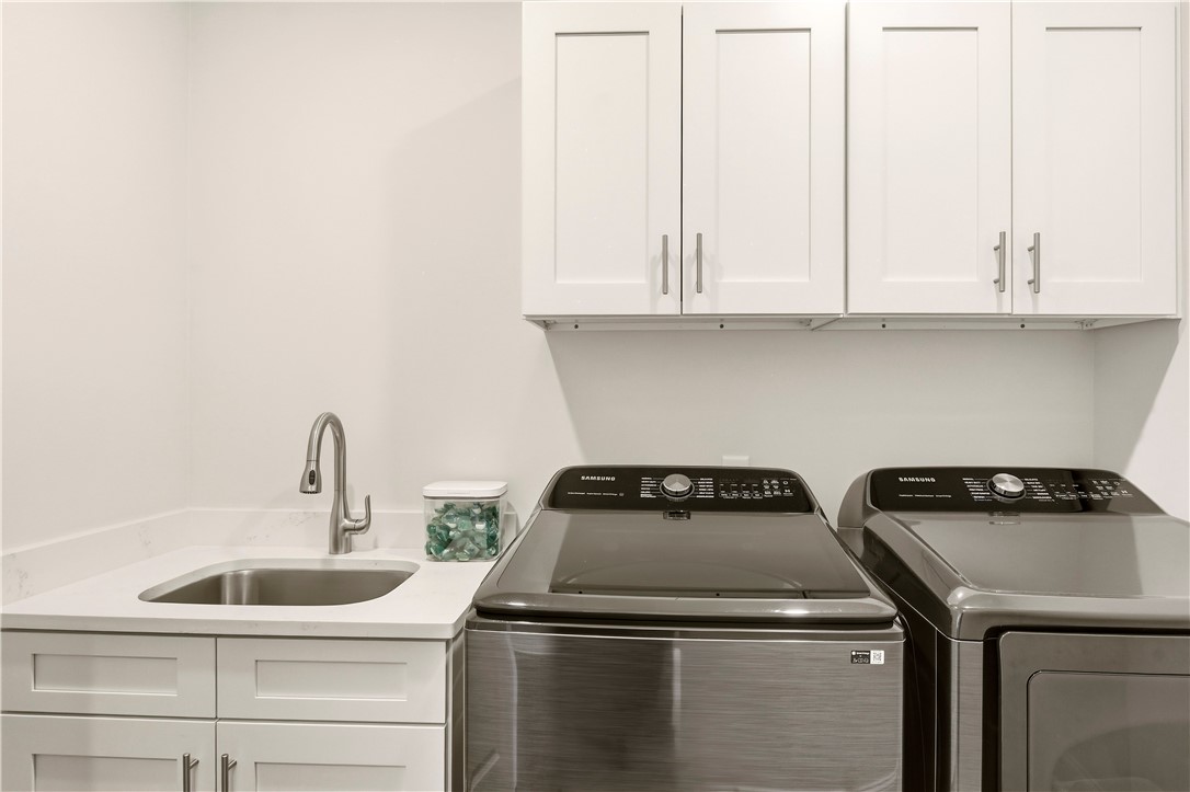 18 Edenham Court Brunswick, GA 31523 - Photo 12 of 32 Doing Laundry is a pleasure here in this home!! Cabinets and a mud sink!!