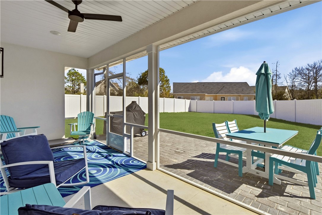 18 Edenham Court Brunswick, GA 31523 - Photo 29 of 32 Wonderful screened porch and brick paver patio and fenced backyard with privacy panels.