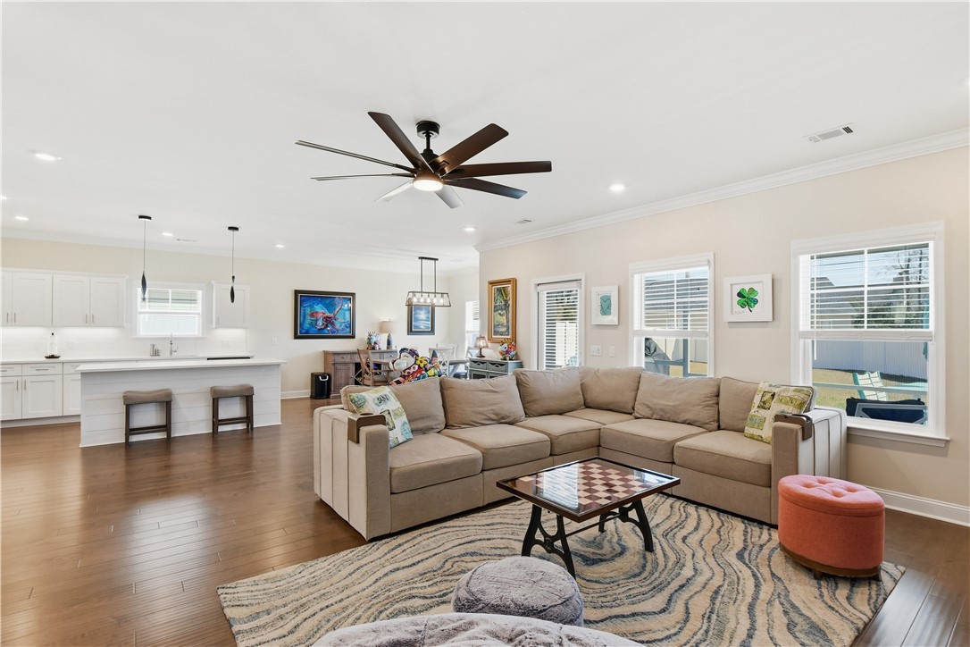 18 Edenham Court Brunswick, GA 31523 - Photo 3 of 32 Living is easy here at this wonderful home, open bright and room for everyone and easy to entertain.