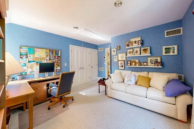 a living room with furniture and a couch