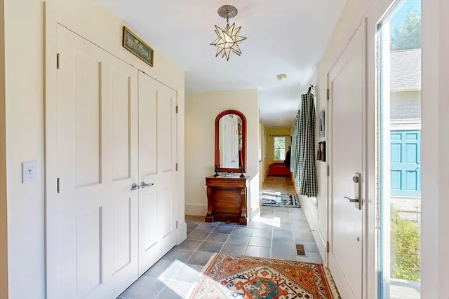 a view of a hallway view with staircase