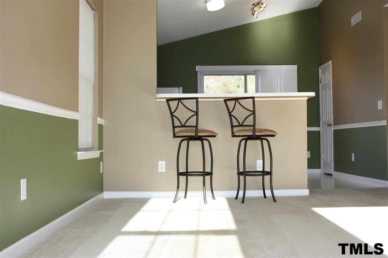 5412 Marthonna Way Raleigh, NC 27616 - Photo 3 of 12 a view of entryway and hall with wooden floor