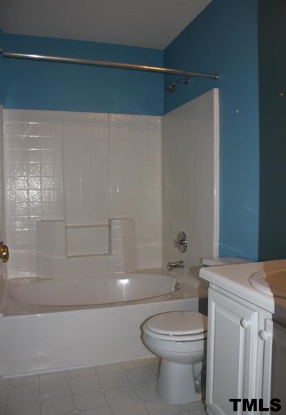 5412 Marthonna Way Raleigh, NC 27616 - Photo 8 of 12 a bathroom with a toilet and a shower