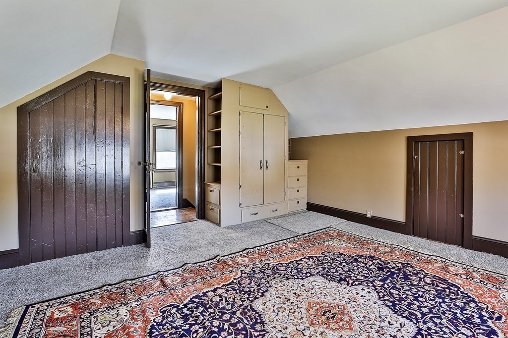 54 Meadowbrook Road Chelmsford, MA 01863 - Photo 19 of 32 a view of an empty room with window and stairs