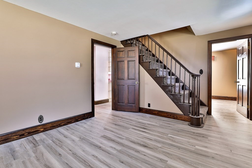 54 Meadowbrook Road Chelmsford, MA 01863 - Photo 2 of 32 a view of an entryway with wooden floor