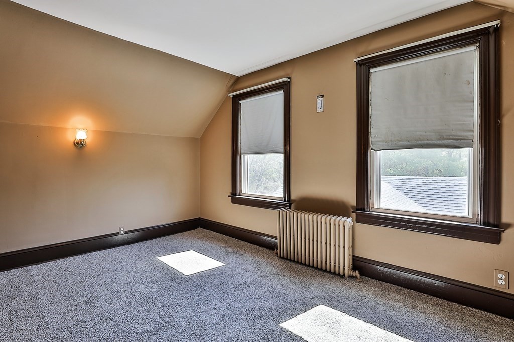 54 Meadowbrook Road Chelmsford, MA 01863 - Photo 22 of 32 an empty room with windows