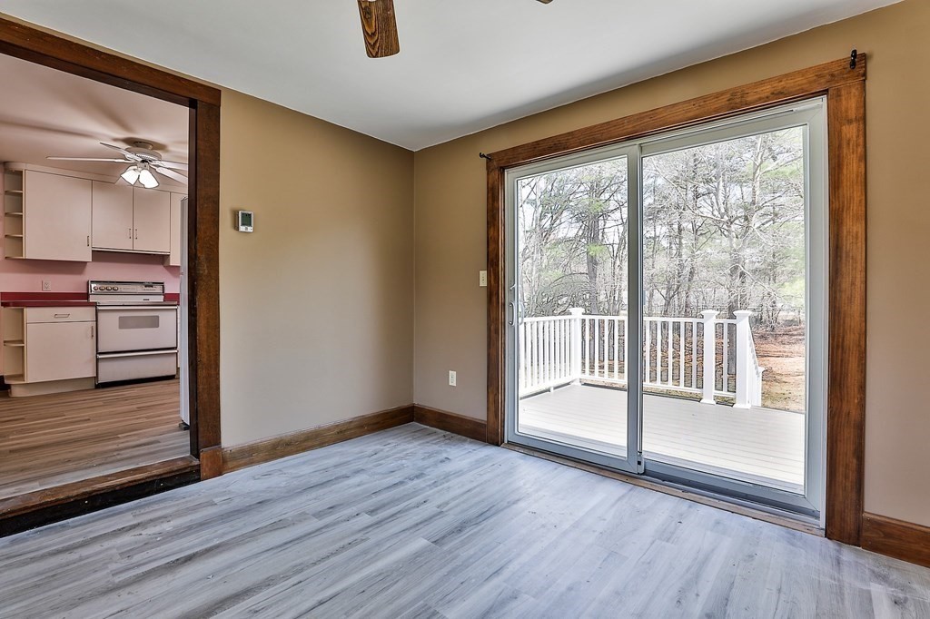 54 Meadowbrook Road Chelmsford, MA 01863 - Photo 8 of 32 wooden floor in an empty room with a window
