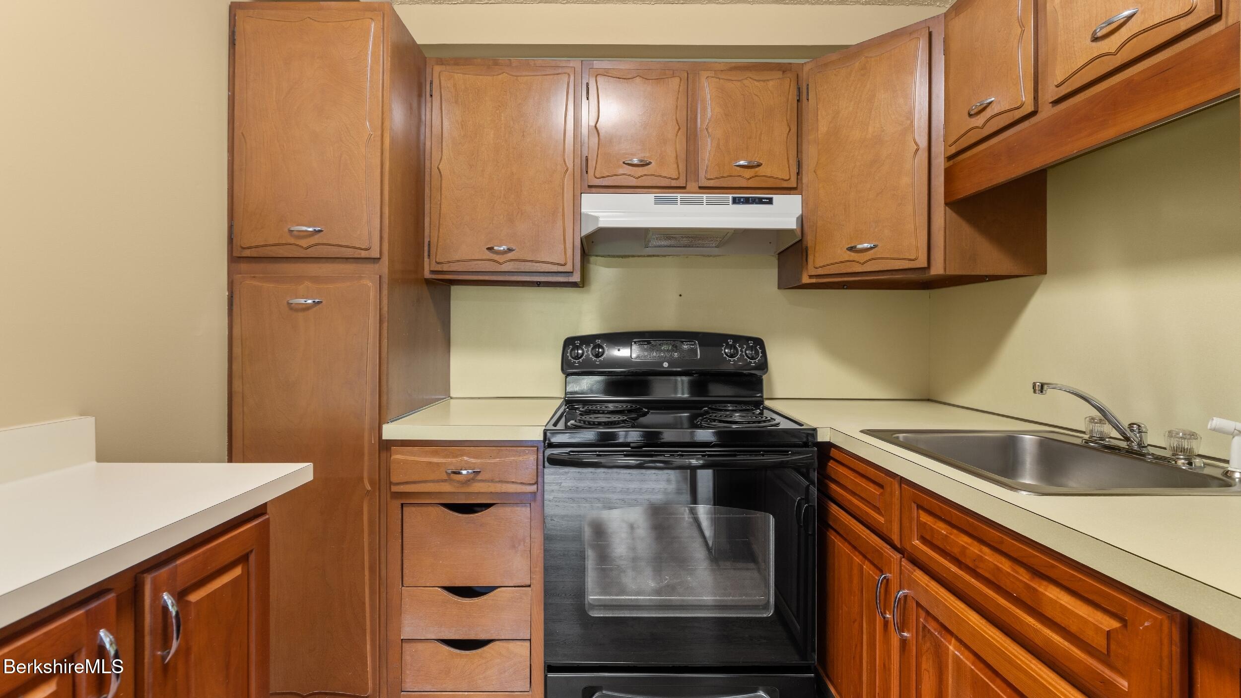 1 Colt Road, Unit 2 Pittsfield, MA 01201 - Photo 11 of 20 a kitchen with a sink and cabinets