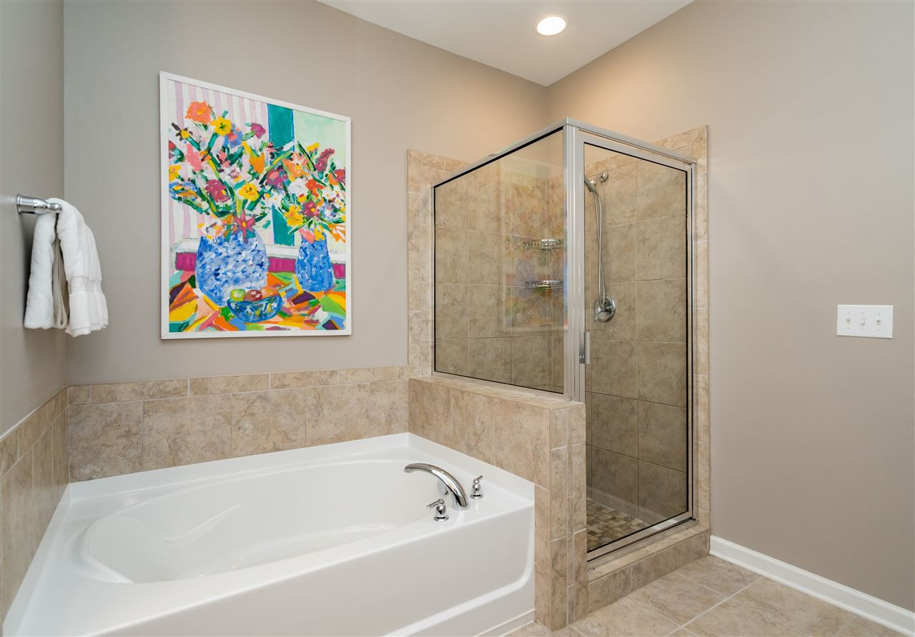439 Plainview Avenue Raleigh, NC 27604 - Photo 20 of 29 Tranquil master bath has a garden tub and walk-in shower! Master Bathroom