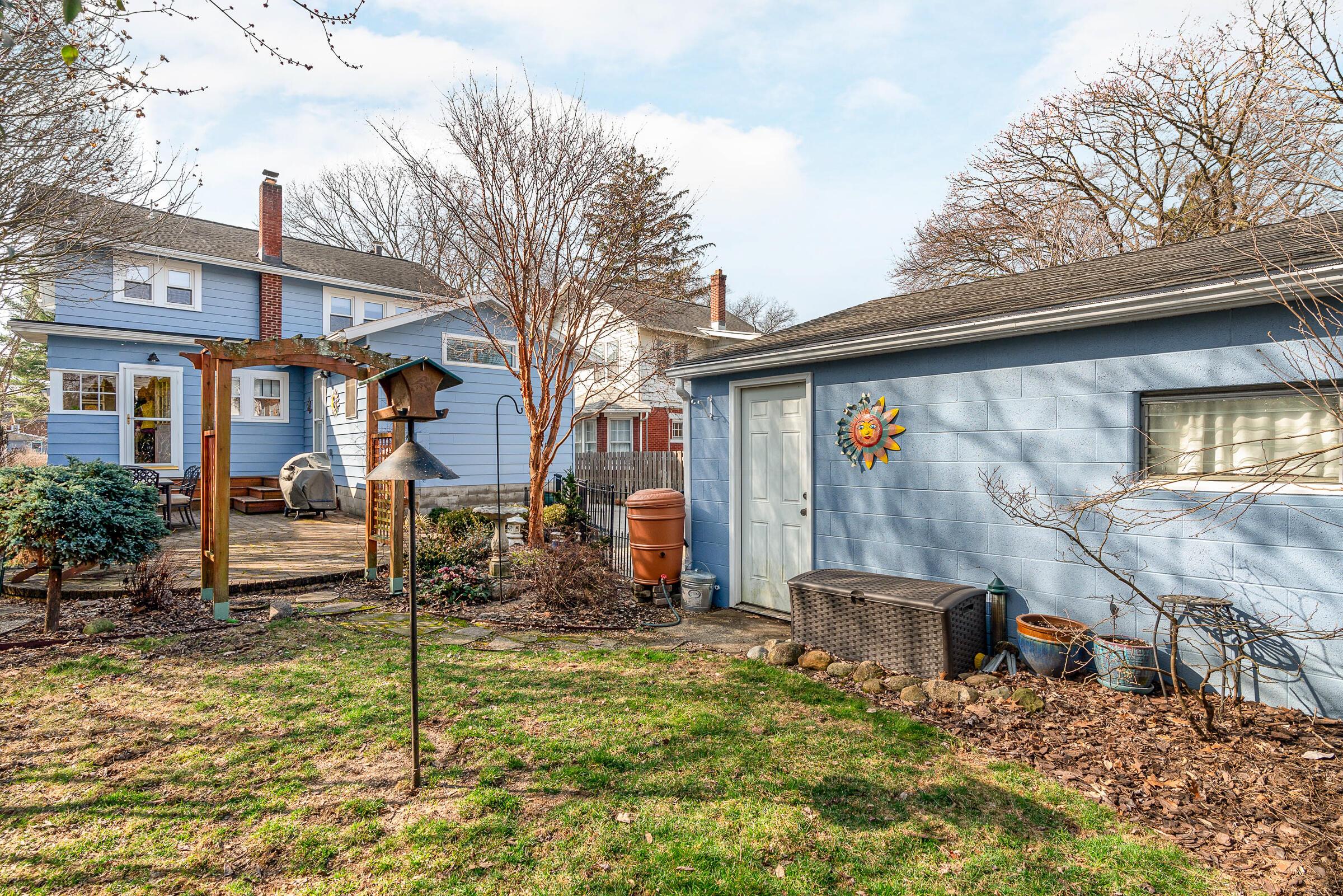 132 Chatham Road Columbus, OH 43214 - Photo 2 of 41 Fairytale charm exudes in this fanciful back yard with a paver patio.