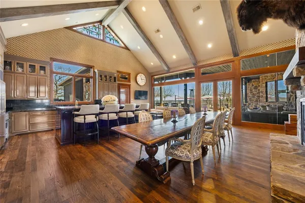 a kitchen with a stove and a refrigerator