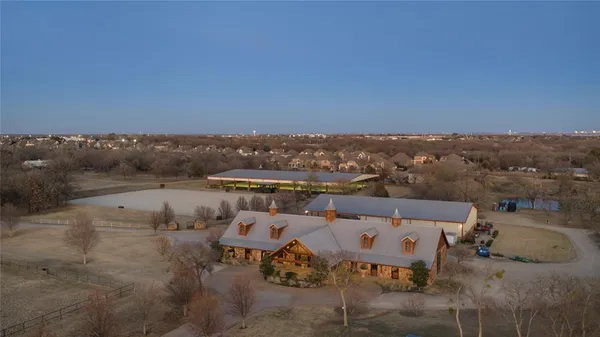 an aerial view of a house with a garden