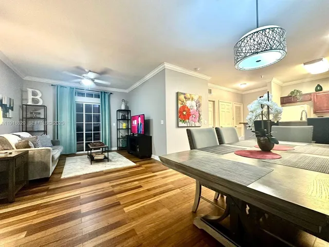 a view of a dining room with furniture