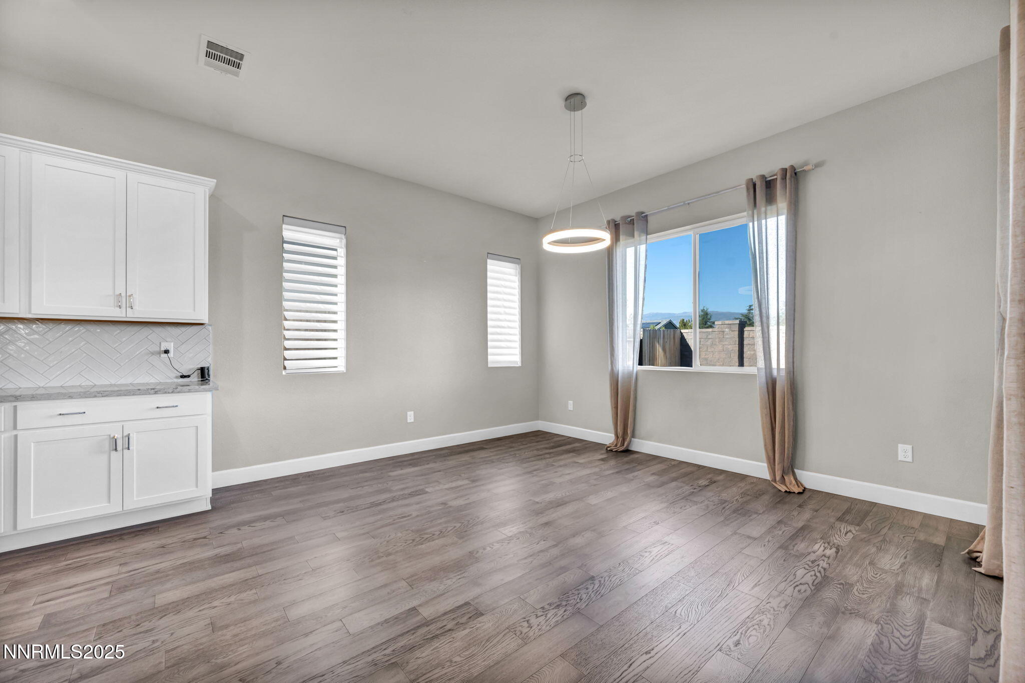 9267 Blue Basin Trail Reno, NV 89521 - Photo 17 of 68 a view of a kitchen and a sink dishwasher and a window