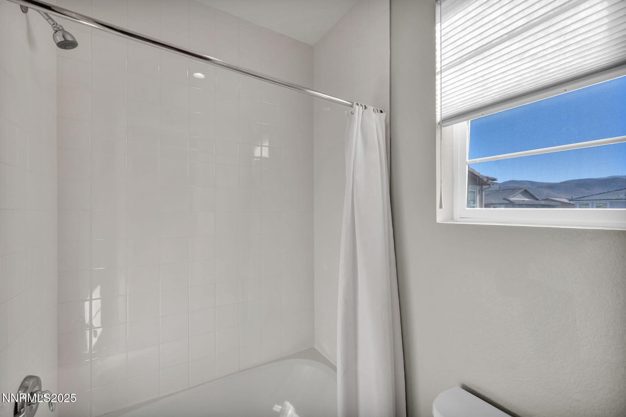 9267 Blue Basin Trail Reno, NV 89521 - Photo 38 of 68 a bathroom with a shower