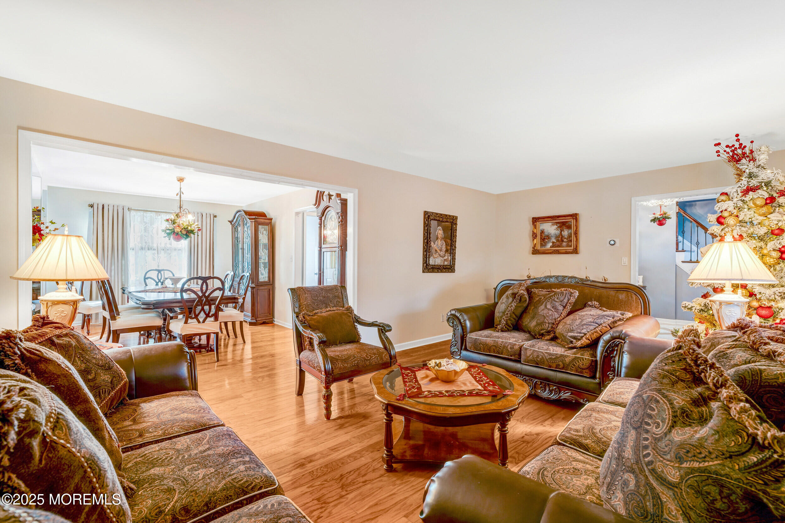 7 Oak Tree Lane Asbury Park, NJ 07712 - Photo 13 of 45 a living room with furniture and a wooden floor